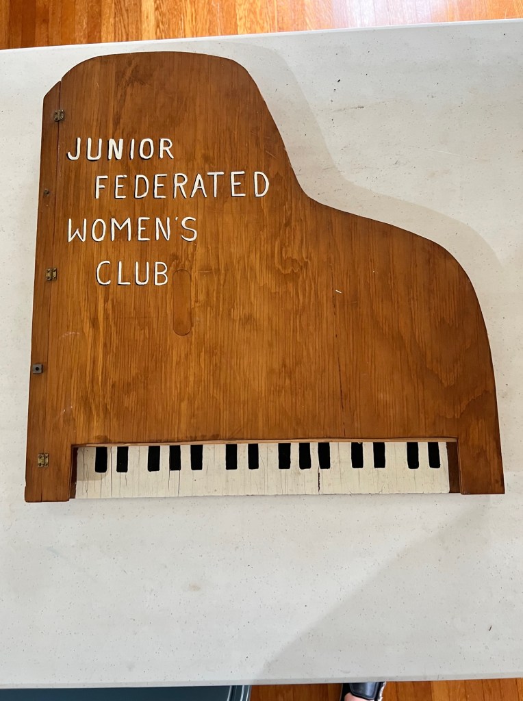 Cover of the 1959 - 1960 scrapbook for the Junior Federated Women's Club in Jackson Ohio.  It is shaped like a grand piano.