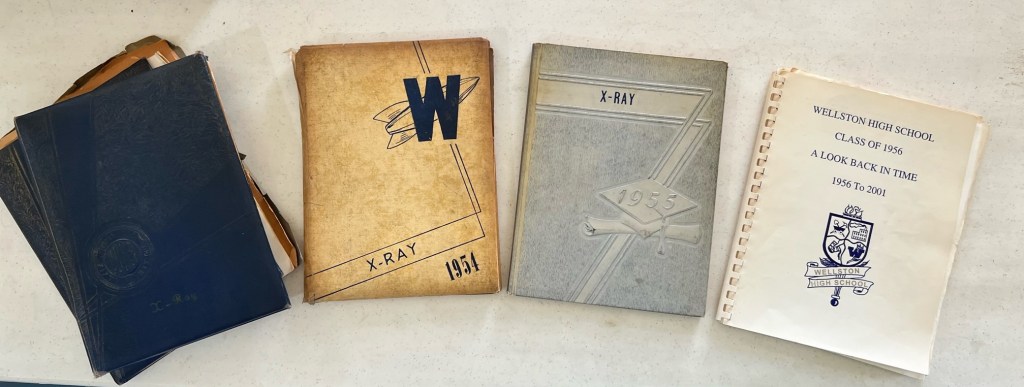 Picture of 4 X-Ray yearbooks from Wellston High School for the years 1943, 1943, and 1955.  A class reunion book for the Wellston High School Class of 1956 at their 45th reunion in 2011.